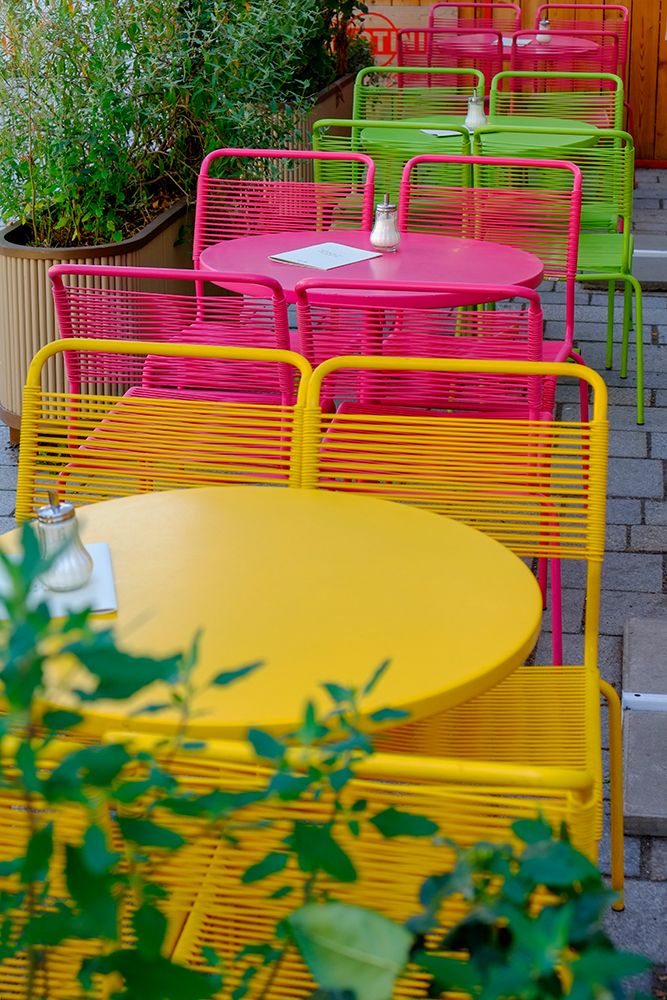 Vienna, Austria. Colorful table and chairs at local cafe